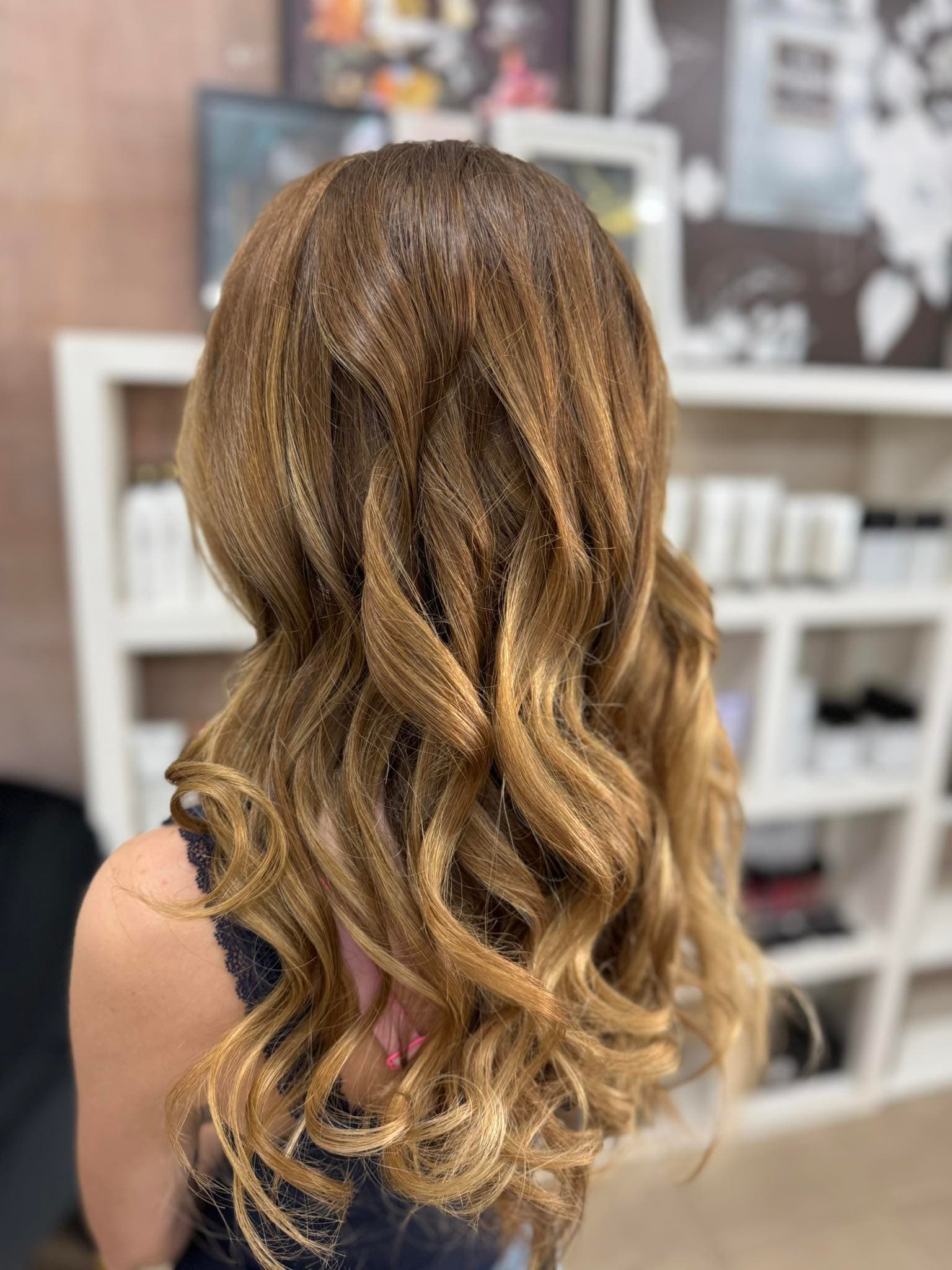 Glossy caramel waves styled at My Place Hair & Beauty in Rockhampton