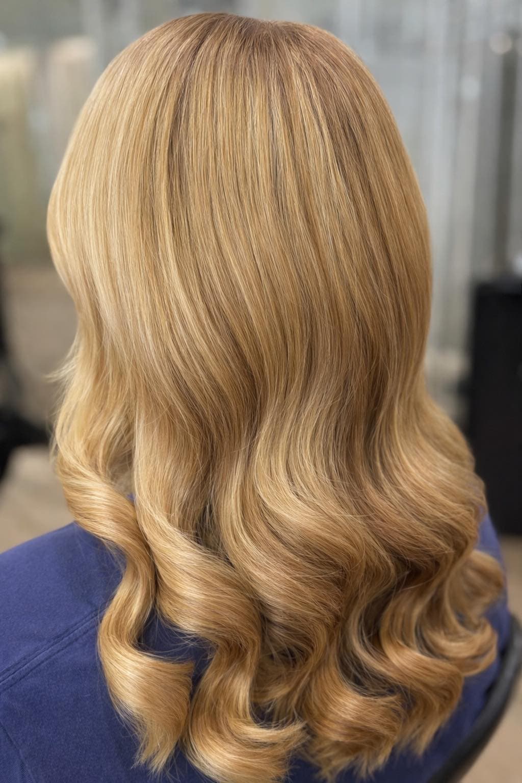 Golden blonde waves finished in the salon